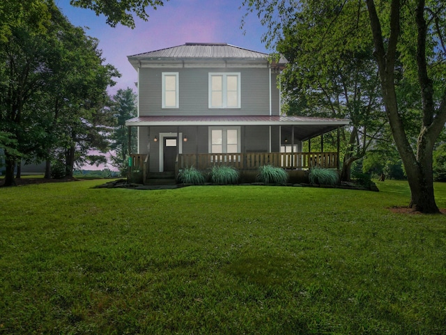 1803 County Road 26, Marengo, OH 43334 - view of front of property with covered porch, a metal roof, a lawn, and french doors