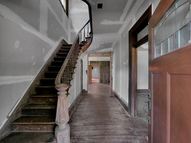 1803 County Road 26, Marengo, OH 43334 - staircase featuring wood finished floors and arched walkways