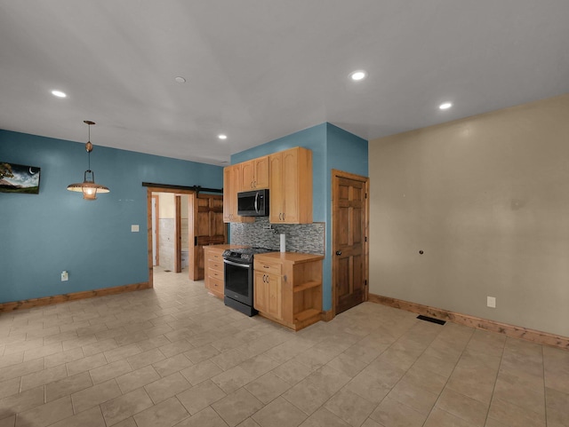 1803 County Road 26, Marengo, OH 43334 - kitchen with range with electric stovetop, stainless steel microwave, backsplash, a barn door, and recessed lighting