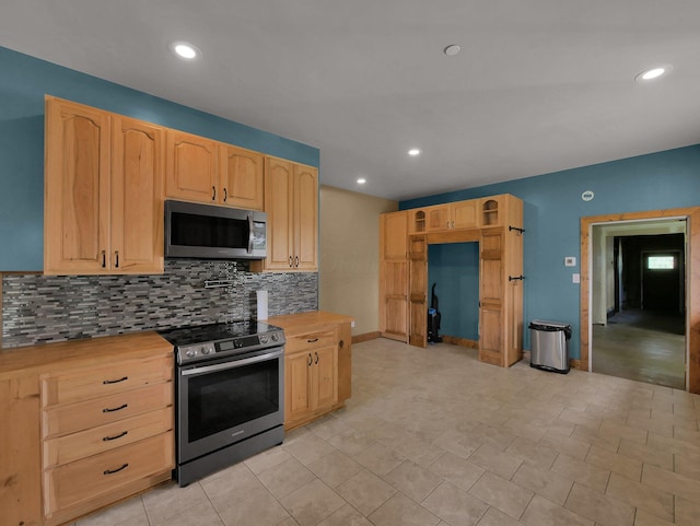 1803 County Road 26, Marengo, OH 43334 - kitchen with appliances with stainless steel finishes, light brown cabinets, decorative backsplash, butcher block counters, and recessed lighting
