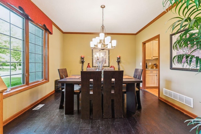 332 Waters Edge Dr, Hebron, OH 43025 - dining area featuring a chandelier and ornamental molding