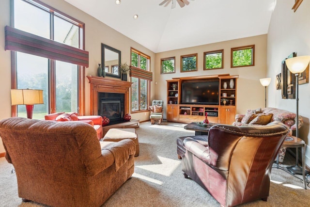 332 Waters Edge Dr, Hebron, OH 43025 - carpeted living room featuring a glass covered fireplace, high vaulted ceiling, recessed lighting, and a ceiling fan