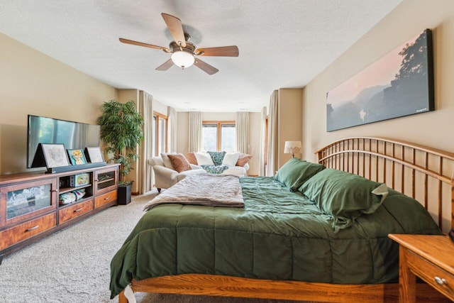 332 Waters Edge Dr, Hebron, OH 43025 - carpeted bedroom with ceiling fan and a textured ceiling