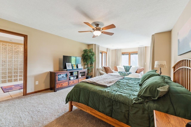 332 Waters Edge Dr, Hebron, OH 43025 - carpeted bedroom with a ceiling fan and a textured ceiling