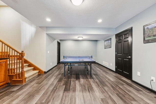 332 Waters Edge Dr, Hebron, OH 43025 - recreation room with wood finished floors, recessed lighting, and a textured ceiling