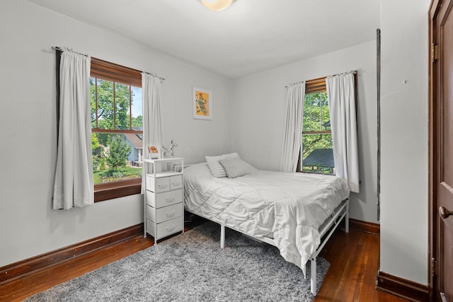 1480 Lincoln Rd, Columbus, OH 43212 - bedroom with dark wood-style flooring and baseboards