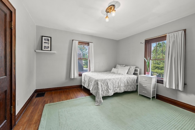1480 Lincoln Rd, Columbus, OH 43212 - bedroom featuring multiple windows and wood finished floors
