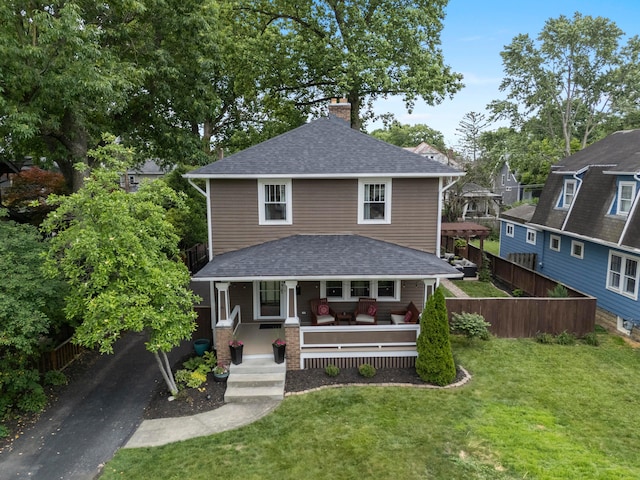 1480 Lincoln Rd, Columbus, OH 43212 - american foursquare style home featuring a chimney, a shingled roof, and a porch