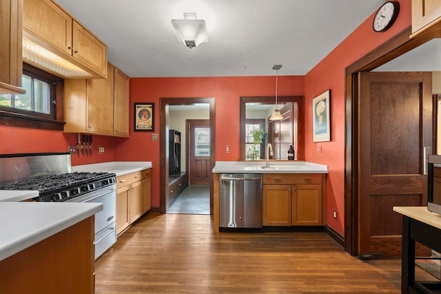1480 Lincoln Rd, Columbus, OH 43212 - kitchen with stainless steel appliances, dark wood-type flooring, light countertops, pendant lighting, and brown cabinets