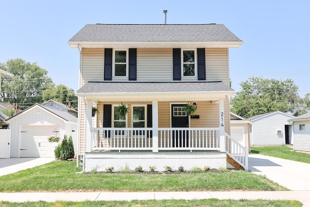 214 Moull St, Newark, OH 43055 - american foursquare style home featuring covered porch, a garage, an outbuilding, a front yard, and a shingled roof