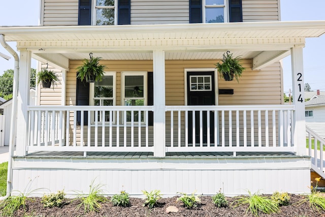 214 Moull St, Newark, OH 43055 - view of exterior entry featuring covered porch