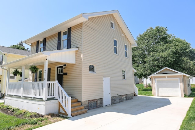 214 Moull St, Newark, OH 43055 - view of property exterior with covered porch, an outbuilding, a detached garage, and driveway