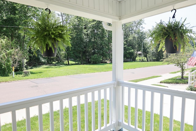 214 Moull St, Newark, OH 43055 - wooden porch with a yard