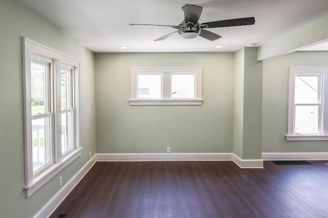 214 Moull St, Newark, OH 43055 - empty room featuring dark wood-style floors and a ceiling fan