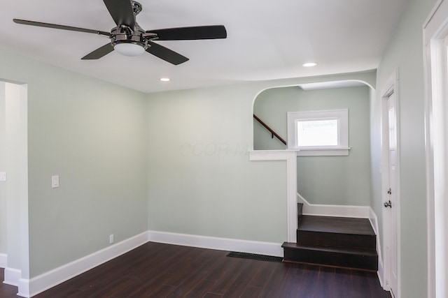 214 Moull St, Newark, OH 43055 - empty room with dark wood-type flooring, recessed lighting, stairs, and ceiling fan