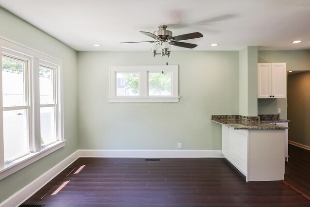 214 Moull St, Newark, OH 43055 - unfurnished dining area featuring dark wood-style floors, recessed lighting, and ceiling fan
