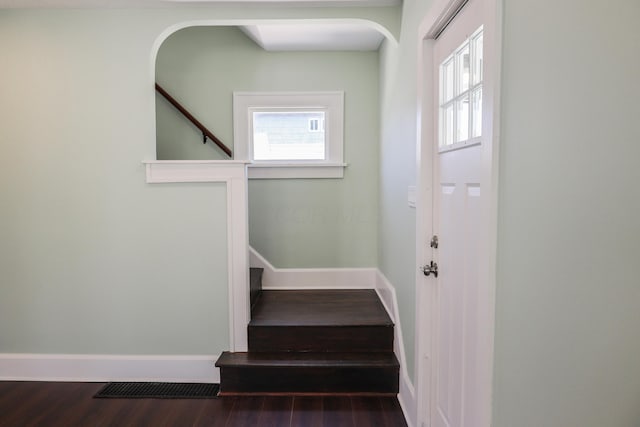 214 Moull St, Newark, OH 43055 - stairway featuring wood finished floors and arched walkways