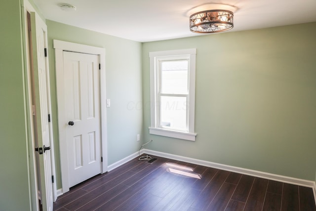 214 Moull St, Newark, OH 43055 - empty room with a smoke detector and dark wood-style floors