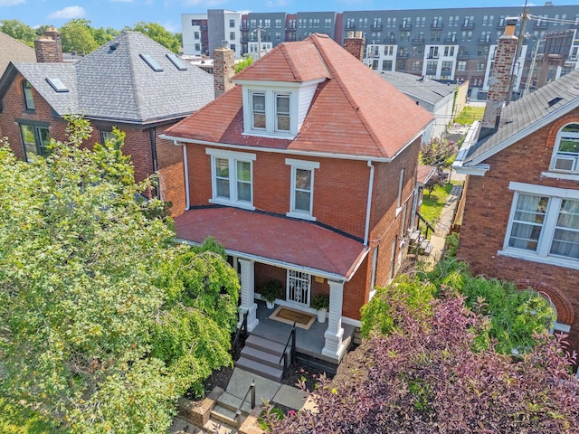 1214 Hamlet St, Columbus, OH 43201 - view of front of home featuring a chimney and brick siding