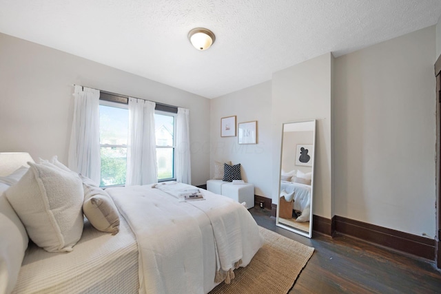 1214 Hamlet St, Columbus, OH 43201 - bedroom with wood finished floors and baseboards
