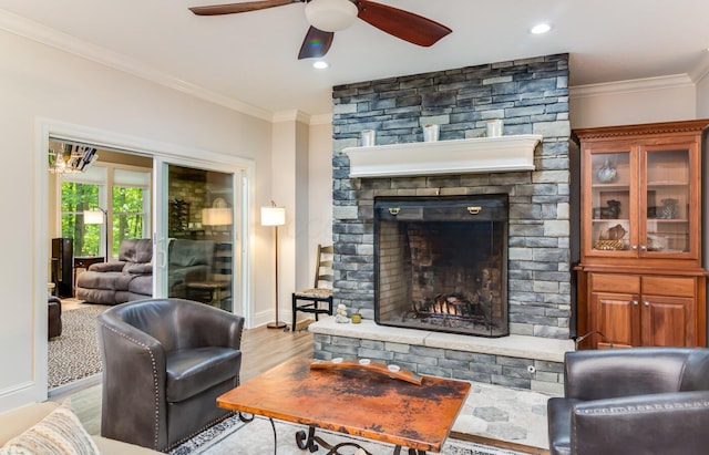 525 Floral Valley Dr W, Howard, OH 43028 - living area featuring ceiling fan, ornamental molding, a fireplace, wood finished floors, and recessed lighting
