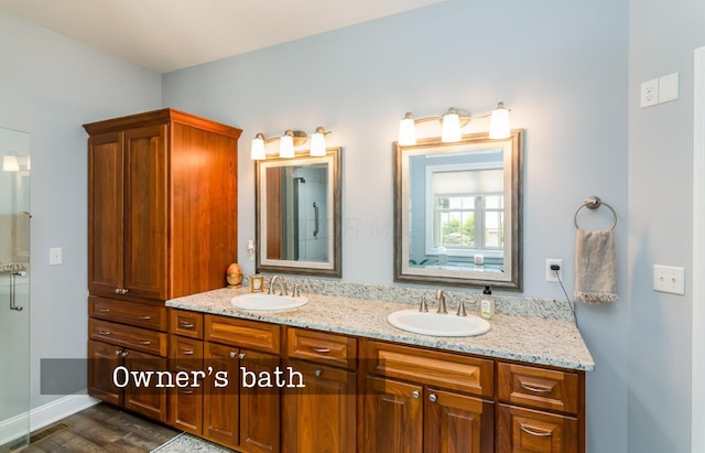 525 Floral Valley Dr W, Howard, OH 43028 - full bath featuring double vanity and wood finished floors