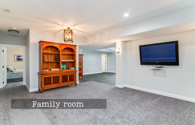 525 Floral Valley Dr W, Howard, OH 43028 - living area featuring dark colored carpet and recessed lighting