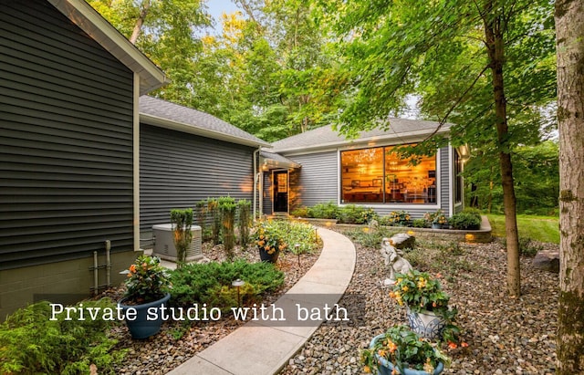 525 Floral Valley Dr W, Howard, OH 43028 - doorway to property with roof with shingles
