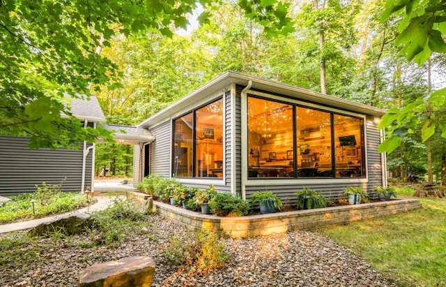 525 Floral Valley Dr W, Howard, OH 43028 - view of side of property featuring a sunroom