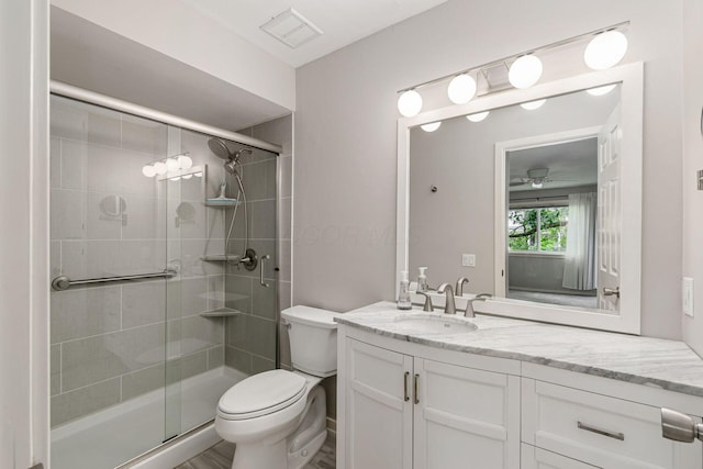 1573 Arlington Ave, Marble Cliff, OH 43212 - full bath with toilet, vanity, a stall shower, and ceiling fan