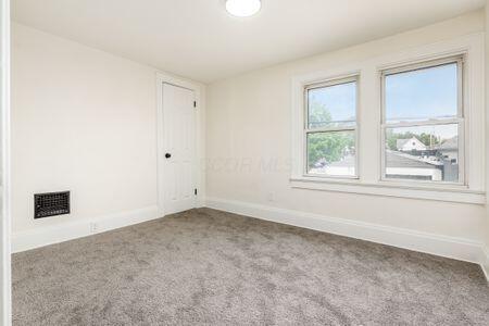 479 Siebert St, Columbus, OH 43206 - carpeted spare room with baseboards