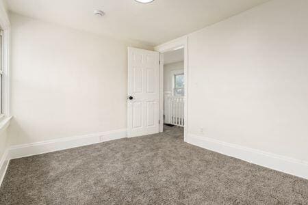479 Siebert St, Columbus, OH 43206 - spare room featuring carpet flooring and baseboards