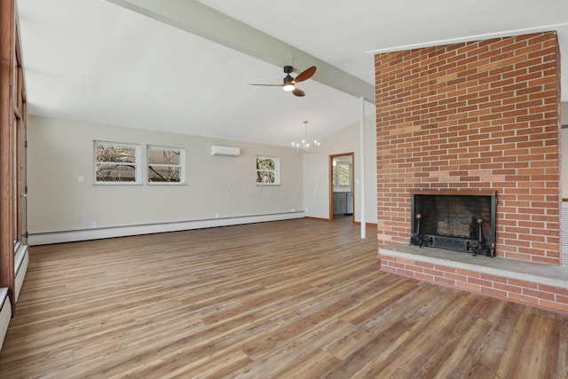 220 Hardy Way, Worthington, OH 43085 - unfurnished living room with a baseboard radiator, a fireplace, wood finished floors, a wall mounted air conditioner, and a chandelier