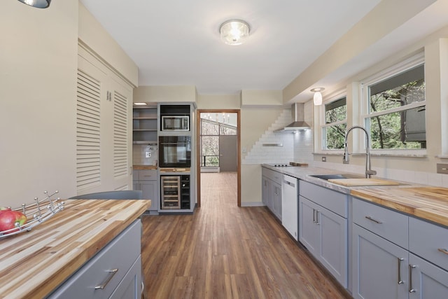 220 Hardy Way, Worthington, OH 43085 - kitchen with butcher block countertops, beverage cooler, black appliances, and gray cabinets