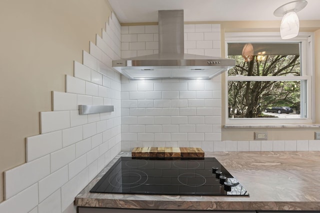 220 Hardy Way, Worthington, OH 43085 - kitchen featuring wall chimney range hood, black electric stovetop, and backsplash