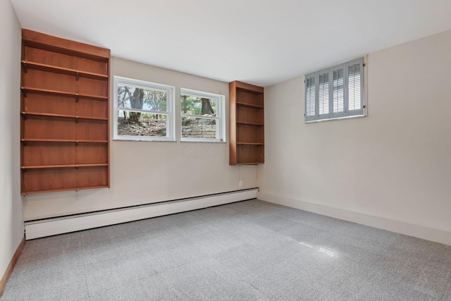 220 Hardy Way, Worthington, OH 43085 - carpeted spare room with baseboard heating and baseboards