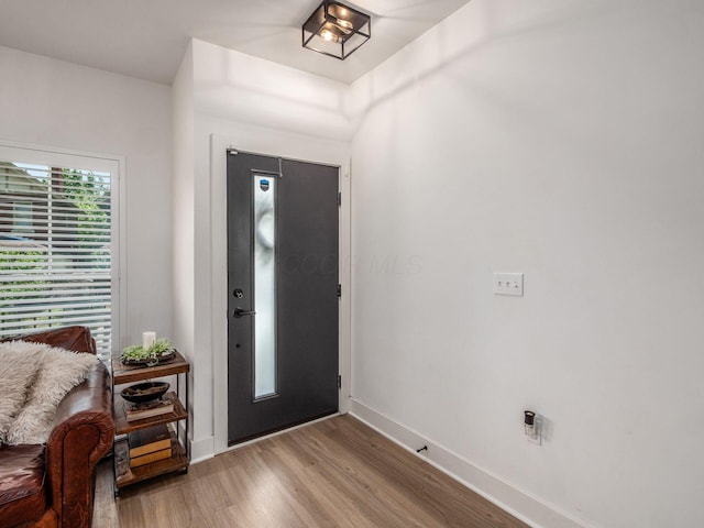 1210 Madison Ave, Columbus, OH 43205 - foyer entrance with light wood finished floors and baseboards