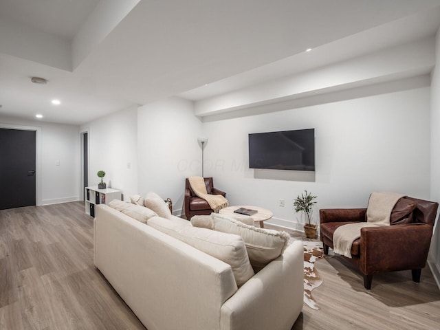 1210 Madison Ave, Columbus, OH 43205 - living area featuring light wood finished floors and recessed lighting