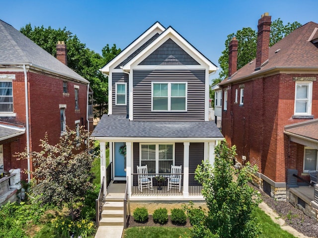 1210 Madison Ave, Columbus, OH 43205 - view of front of property with a porch and roof with shingles