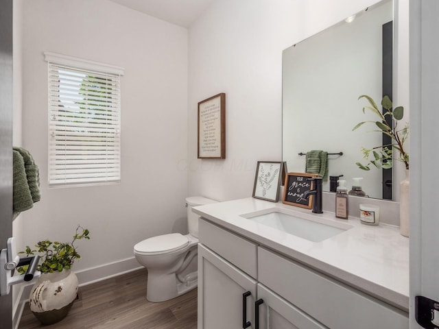 1210 Madison Ave, Columbus, OH 43205 - half bathroom with wood finished floors and vanity