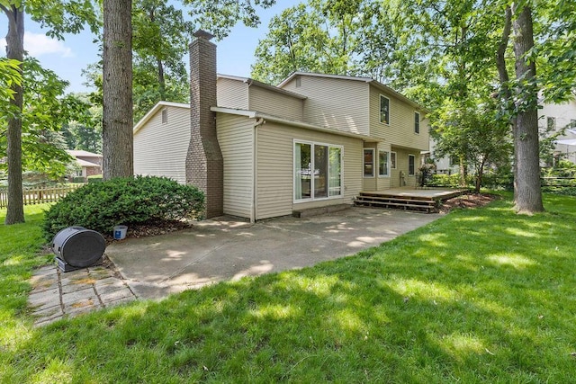 1212 Autumn Creek Cir, Westerville, OH 43081 - back of house with a chimney, a patio area, and a deck
