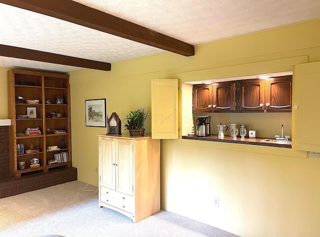 1212 Autumn Creek Cir, Westerville, OH 43081 - bar area with light colored carpet, beam ceiling, and a textured ceiling