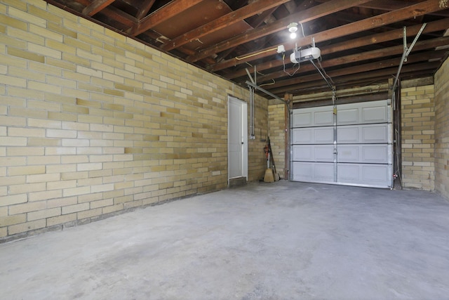714 E 2nd St, Logan, OH 43138 - garage featuring a garage door opener