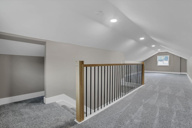 714 E 2nd St, Logan, OH 43138 - additional living space featuring carpet floors, vaulted ceiling, and recessed lighting