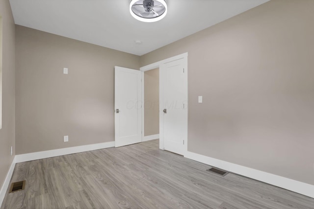 714 E 2nd St, Logan, OH 43138 - empty room with wood finished floors and a ceiling fan