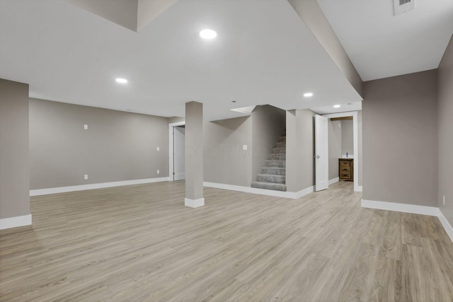 714 E 2nd St, Logan, OH 43138 - finished basement featuring stairs, light wood finished floors, and recessed lighting