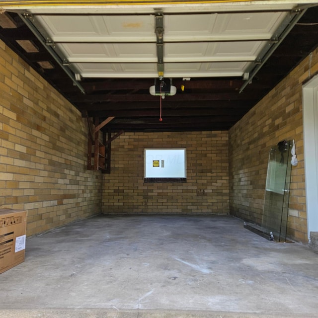 714 E 2nd St, Logan, OH 43138 - garage featuring a garage door opener