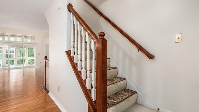 1486 Sedgefield Dr, New Albany, OH 43054 - staircase featuring wood finished floors and baseboards