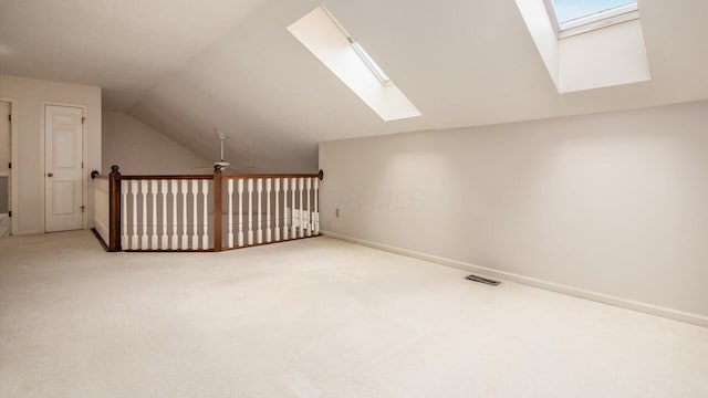 1486 Sedgefield Dr, New Albany, OH 43054 - additional living space featuring a skylight, lofted ceiling, carpet flooring, and a ceiling fan