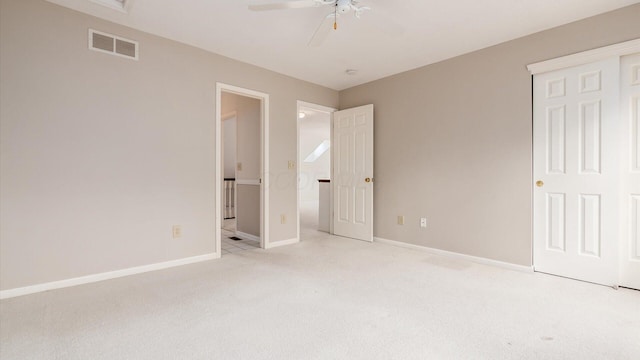 1486 Sedgefield Dr, New Albany, OH 43054 - unfurnished bedroom featuring light carpet, connected bathroom, and a ceiling fan